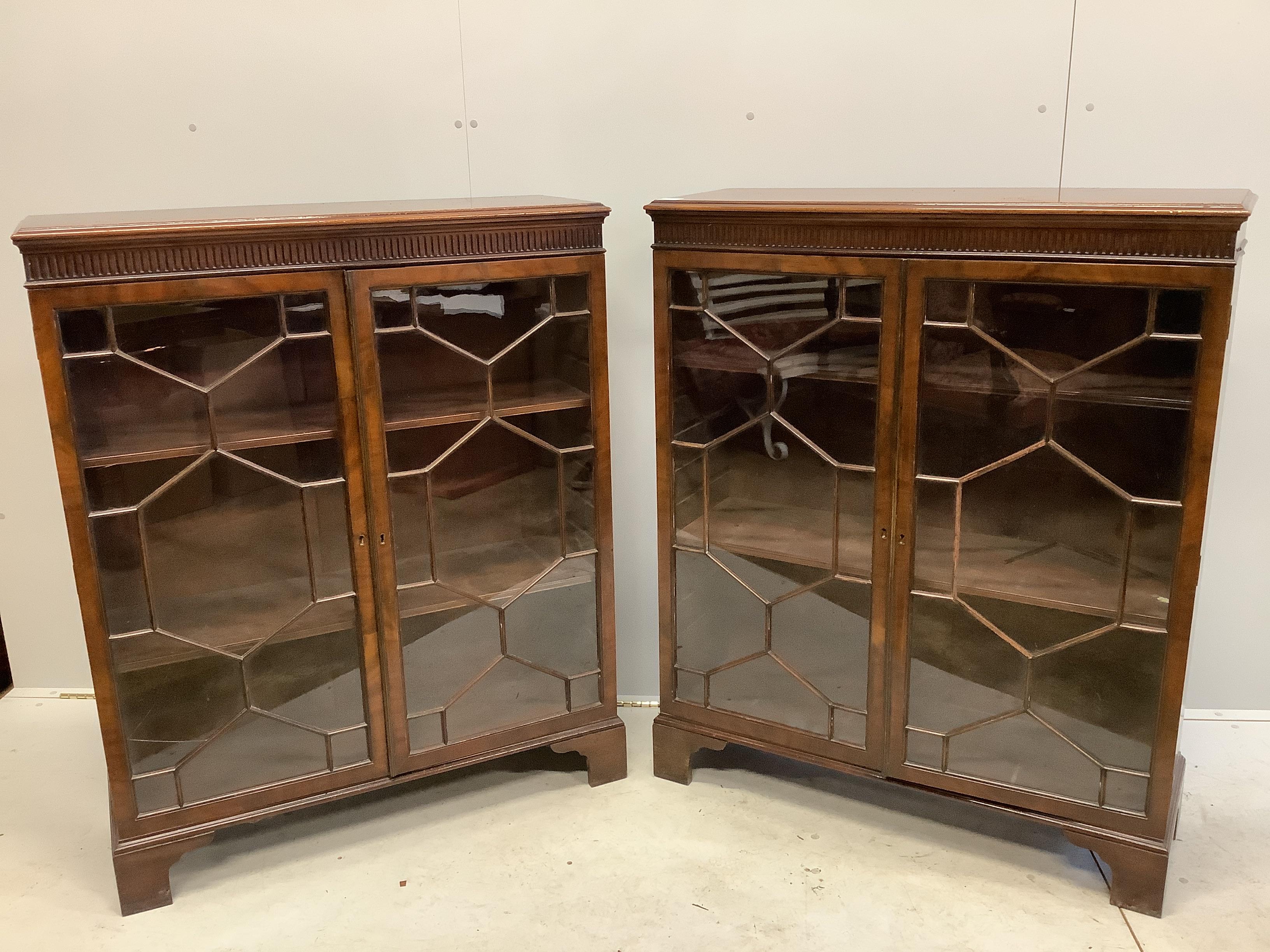 A pair of Chippendale Revival mahogany dwarf bookcases, each 97cm, depth 34cm, height 119cm